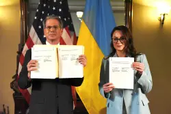 Here’s how Trump made Ukraine pay for military aid with long-awaited minerals deal